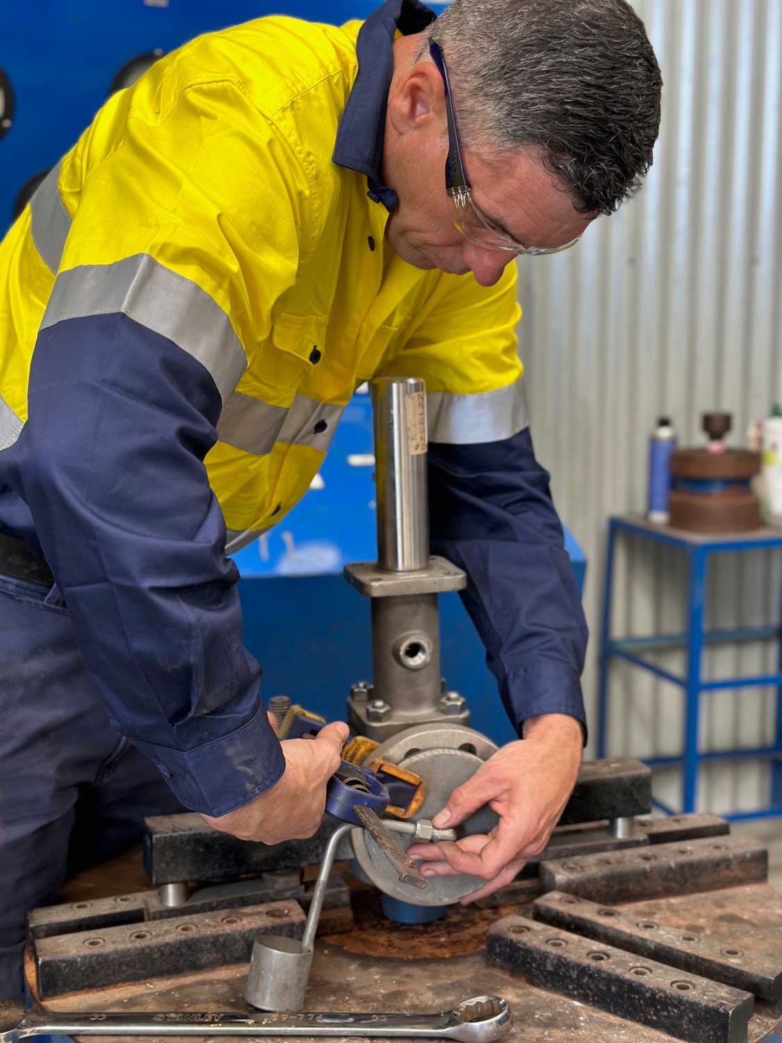 man working on a machine